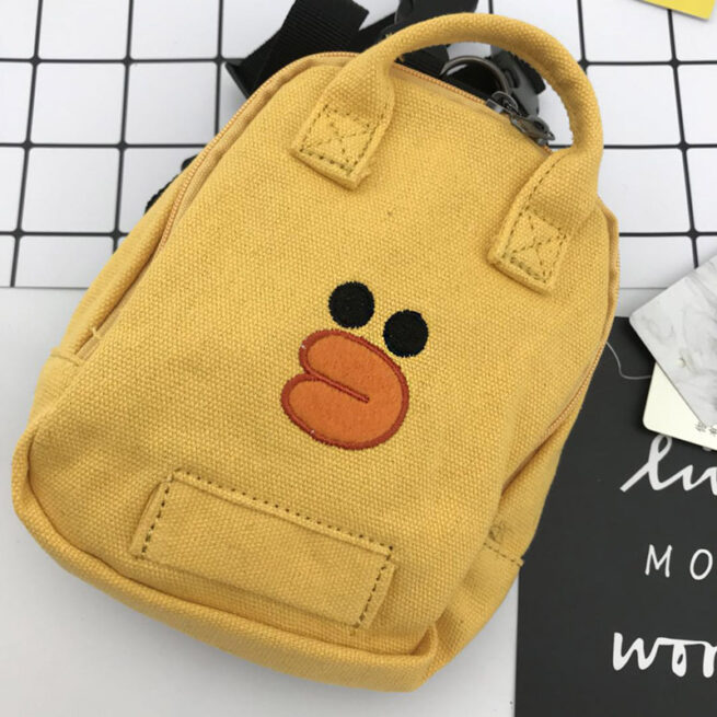 Mochila moderna para perros amarilla con cara de patito